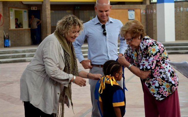 MP Michael Cardo and Mayor Nicolette Botha-Guthrie, along with Ward 4 Councillor Lianda Beyers-CronjÃ© assist a grade-one learner with her backpack at the specially marked ceremony at Mount Pleasant Primary,   where  three  classes  of  grade-one  learners  received  a   stationery-filled backpack courtesy of the Ward 4 Backpack Project.